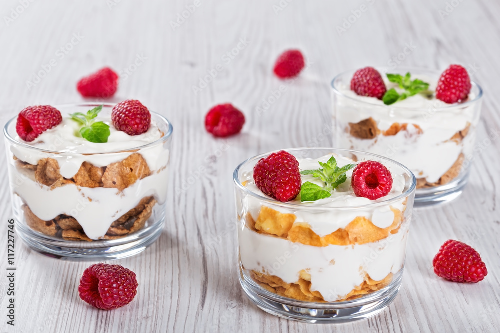 homemade yogurt in cups with whole grain flakes homemade yogurt in cups with whole grain flakes