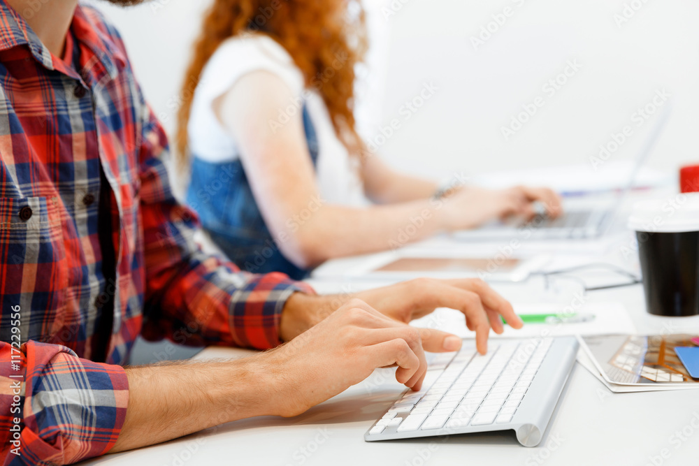 Hands typing on the keyboard Hands typing on the keyboard