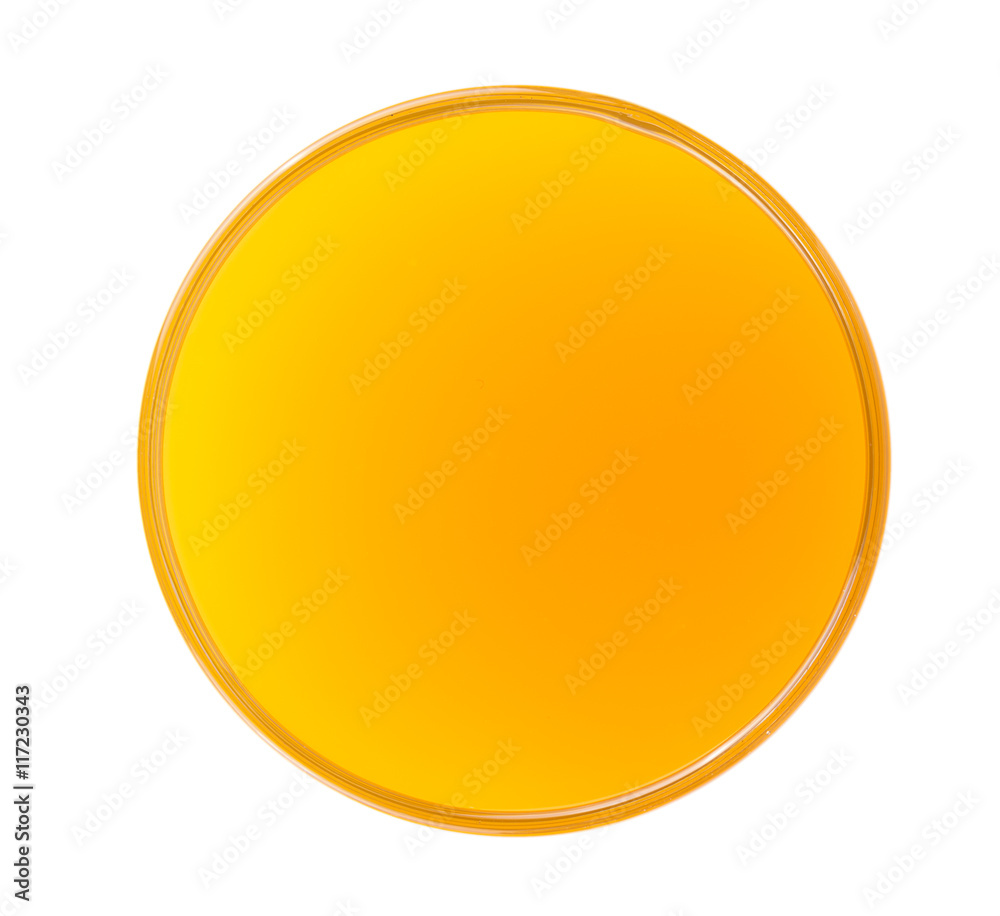 Glass of orange juice from above.top view