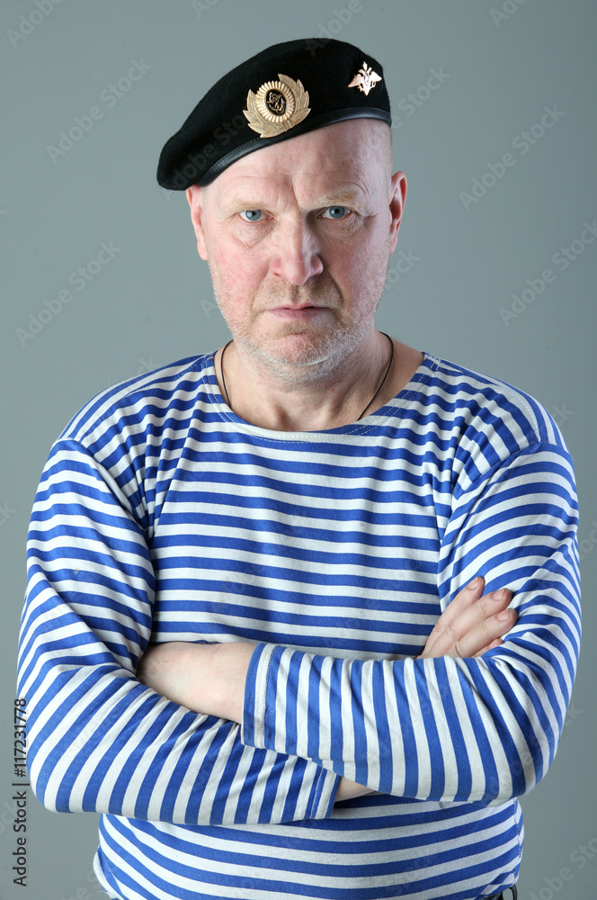 portrait of a man in a striped vest portrait of a man in a striped vest
