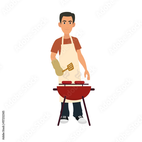 Young Man Cooking Sausages on Barbecue During Summer.