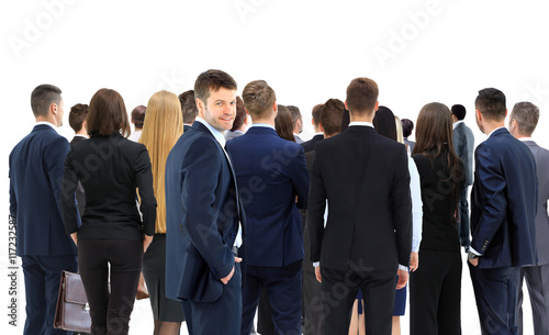 Large group of businesspeople standing back side