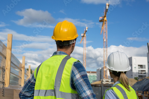 Female engineer and foreman working together