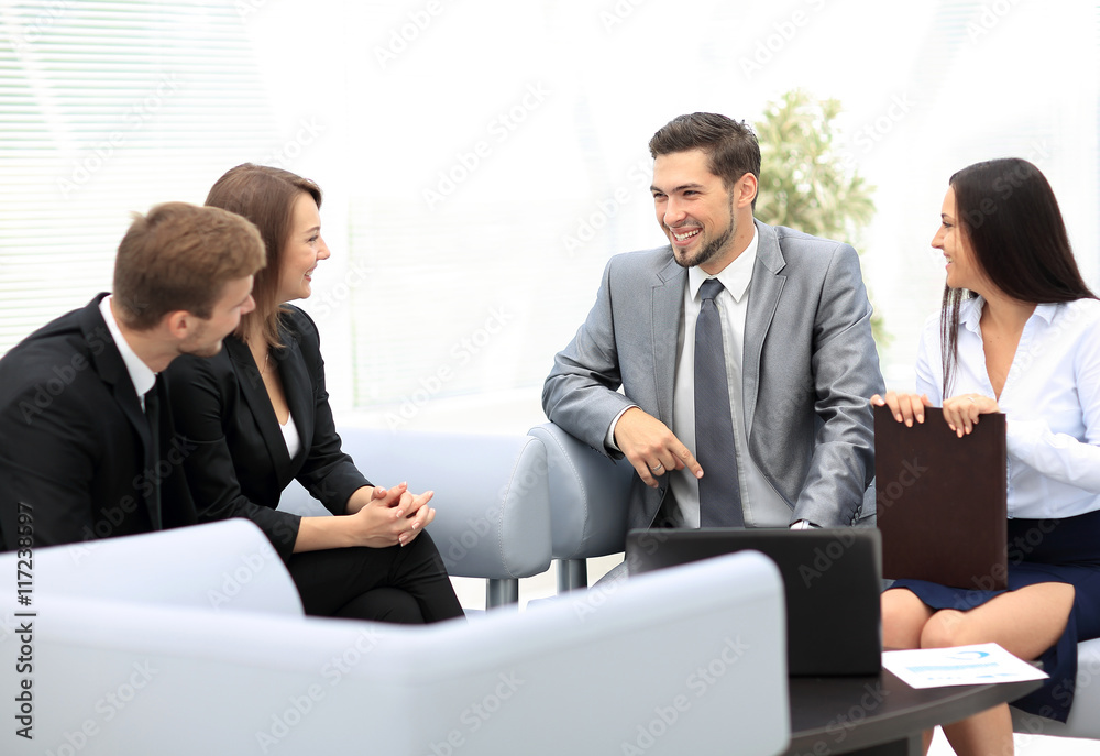 Happy business people talking on meeting at office Happy business people talking on meeting at office