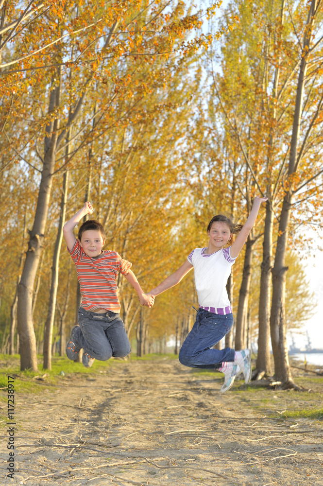 Obraz premium Happy active children jumping