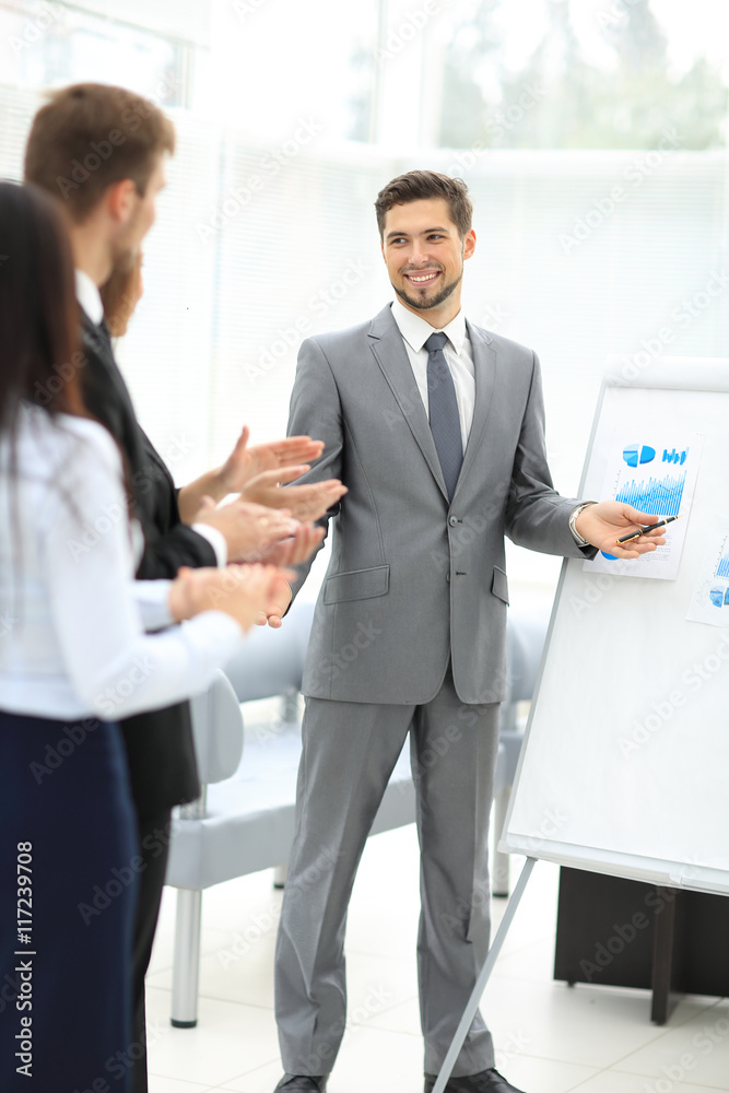 Business people clapping at conference Business people clapping at conference