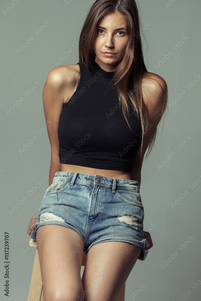 model tests of young pretty girl over grey background model tests of young pretty girl over grey background