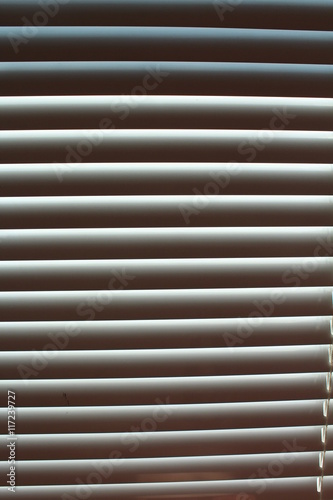 closed blinds at the window photo