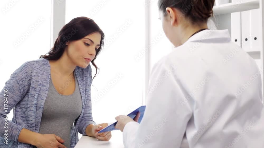 gynecologist and pregnant woman at hospital gynecologist and pregnant woman at hospital