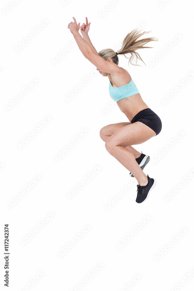Female athlete jumping Female athlete jumping