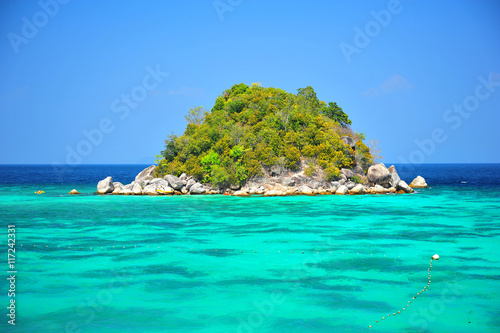Tropical Island with Beautiful Blue Sea © karinkamon