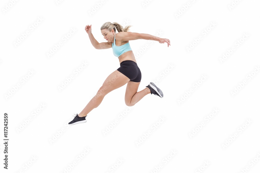 Female athlete jumping Female athlete jumping