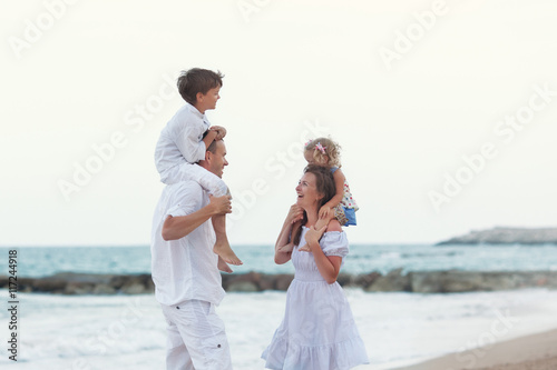 Portrait of Happy big beautiful family near sea, © rimmdream