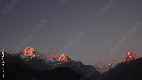 Timelapse of the Annapurna range at sunset as seen from Ghandruk in Nepal photo