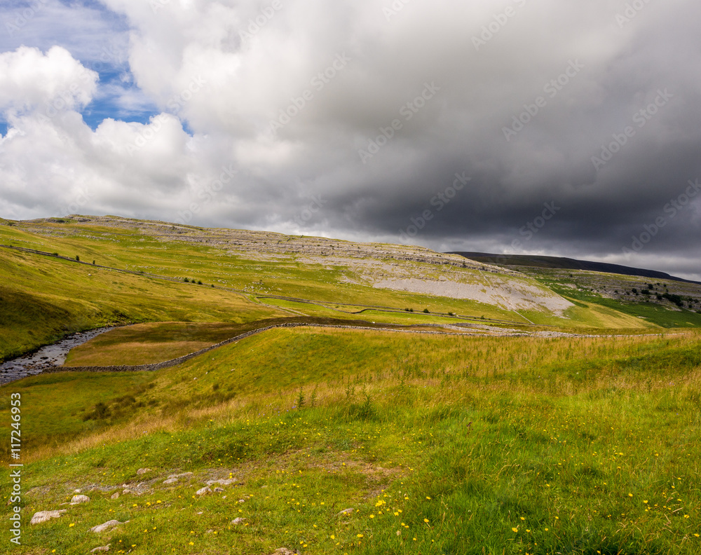 Storm clouds approaching above the Ingleton Waterfalls Trail, Ingleton, North Yorkshire, UK Storm clouds approaching above the Ingleton Waterfalls Trail, Ingleton, North Yorkshire, UK