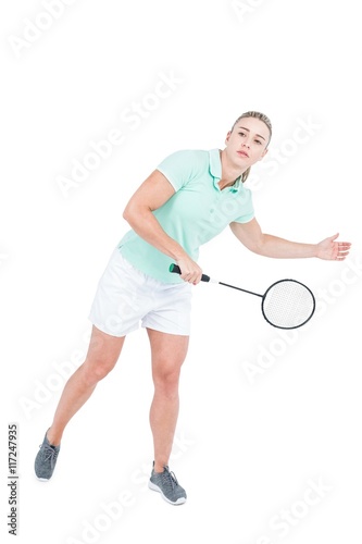Pretty blonde playing badminton 