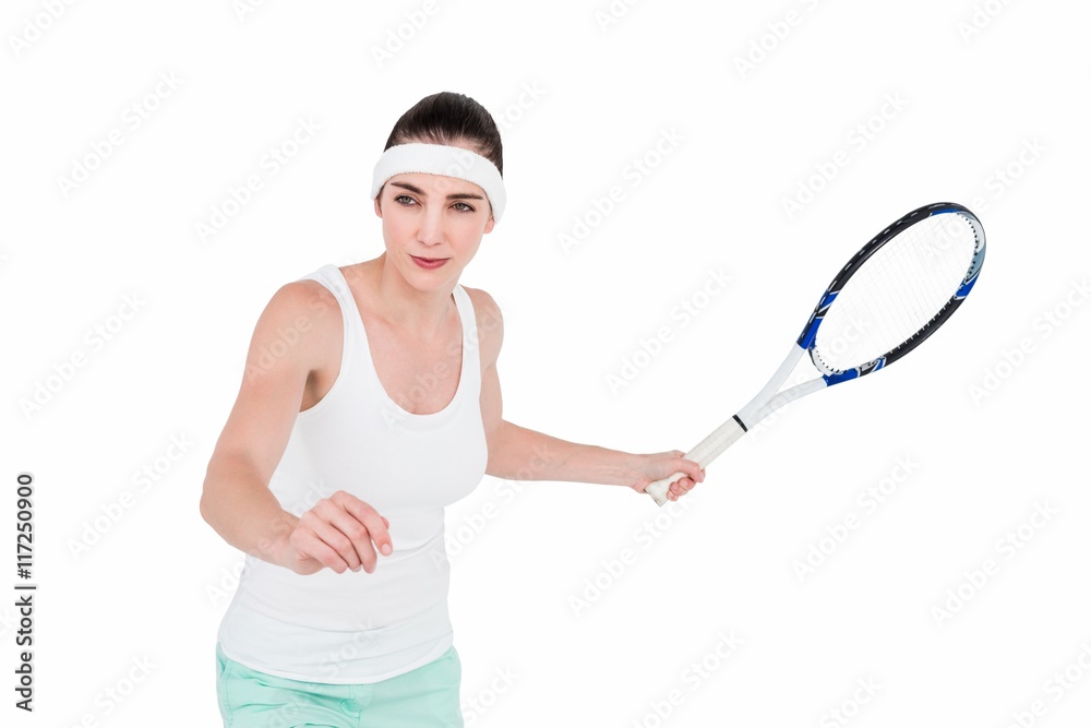 Female athlete playing tennis Female athlete playing tennis