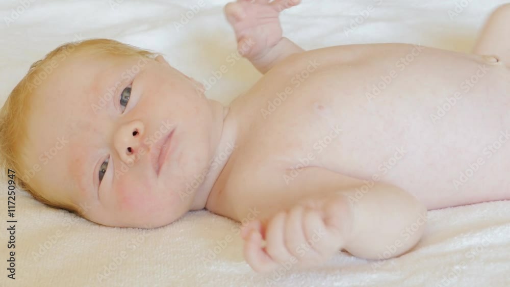 A newborn baby looks and emotes , 5 day
A newborn baby looks and emotes , 5 day
