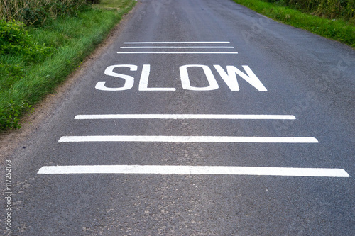 Slow Sign freshly painted on road