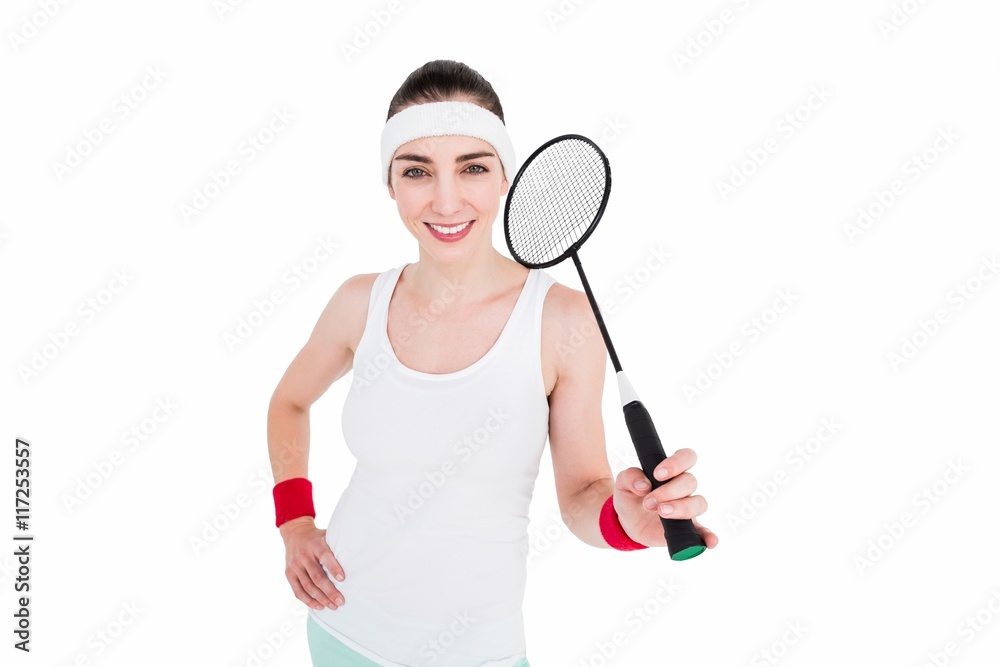 Female athlete playing badminton Female athlete playing badminton