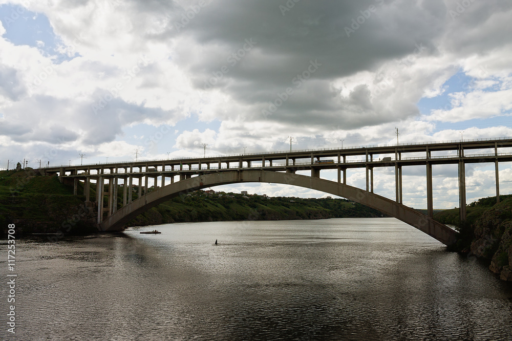 bridge across the Dnieper River in Zaporozhye cloudy day