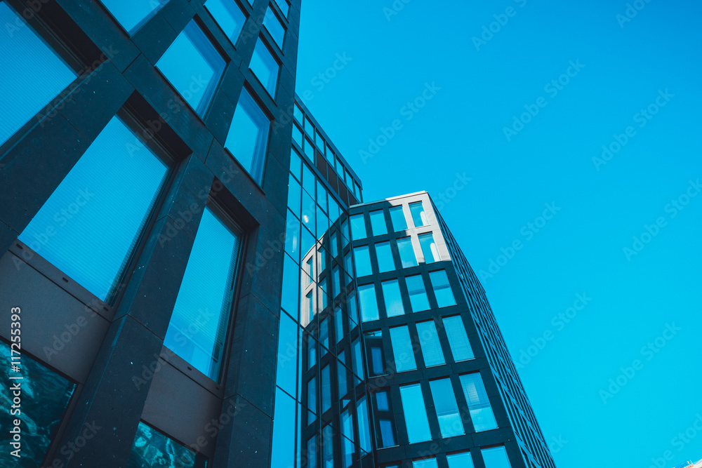 Obraz premium Low angle view on tall office building