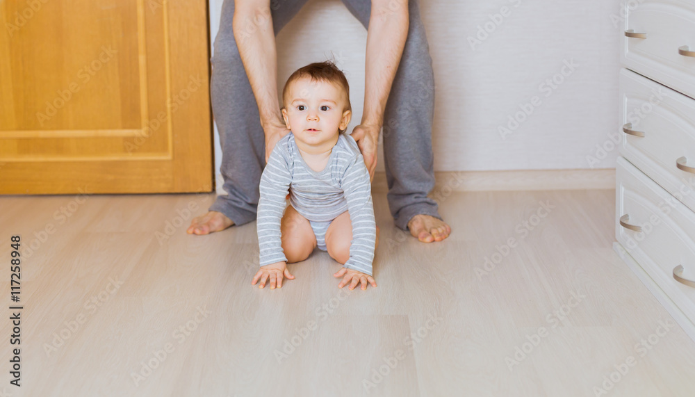 Happy crawling baby boy with mother Happy crawling baby boy with mother
