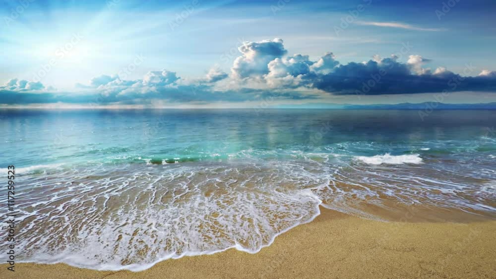 Beautiful mediterranean sea coastline, large storm clouds moving over the horizon, strong waves crashing in slow motion on seashore with foam on yellow sand, perfect for film, digital composition