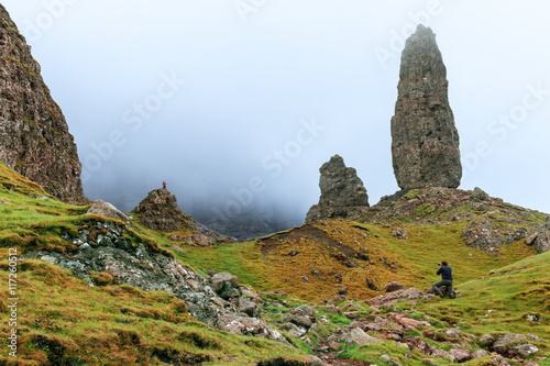 Photographer taking a picture for an outdoor campaign, The old man of Storr