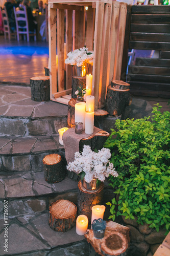 Rustic wedding decor, decorated stairs with sumps and lilac arra photo