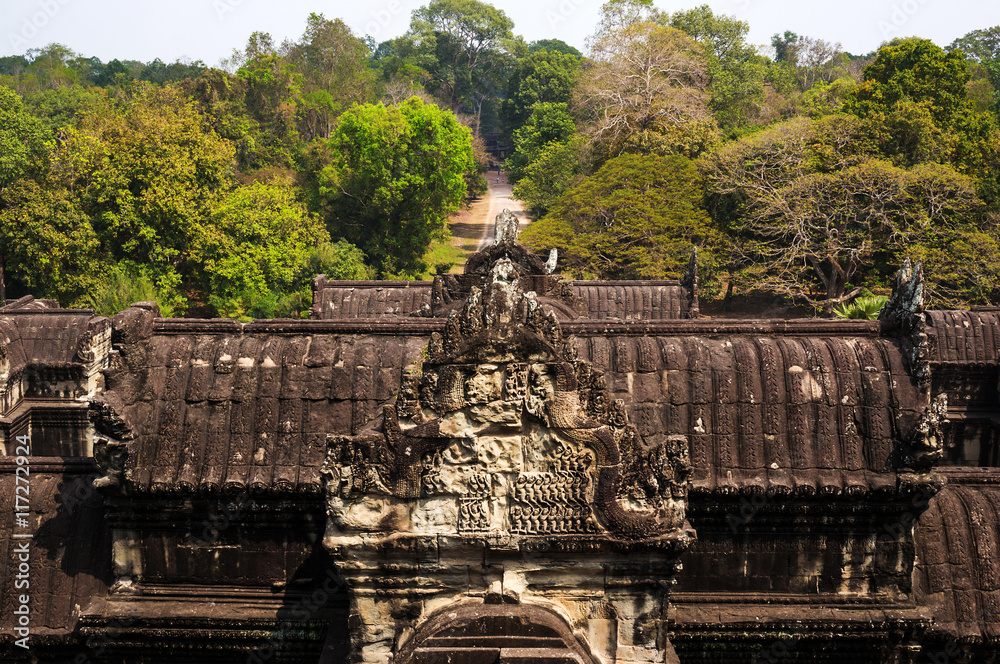 The carved image stone is on the roof at Angkor Wat, Cambodia.