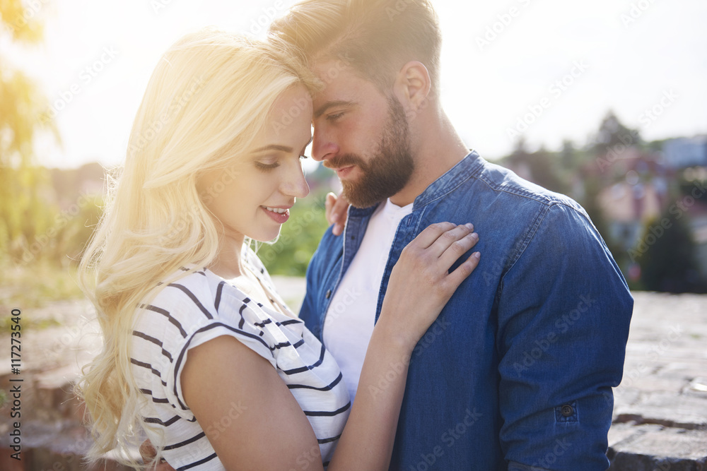 Loving and full of passion couple at sunset Loving and full of passion couple at sunset