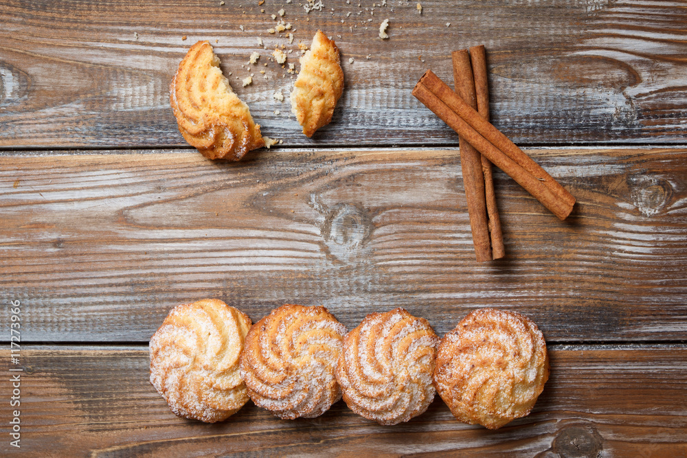 cookies with cinnamon on a rustic background cookies with cinnamon on a rustic background