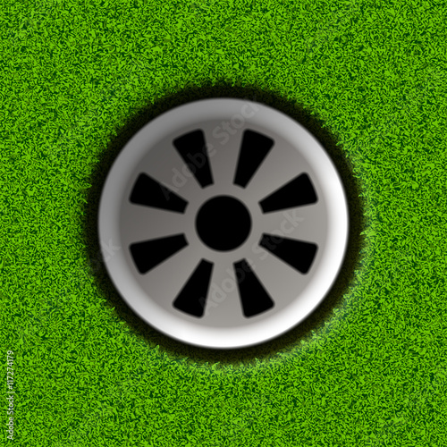 Golf hole on field