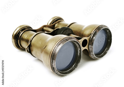 Old binoculars isolated on white background
