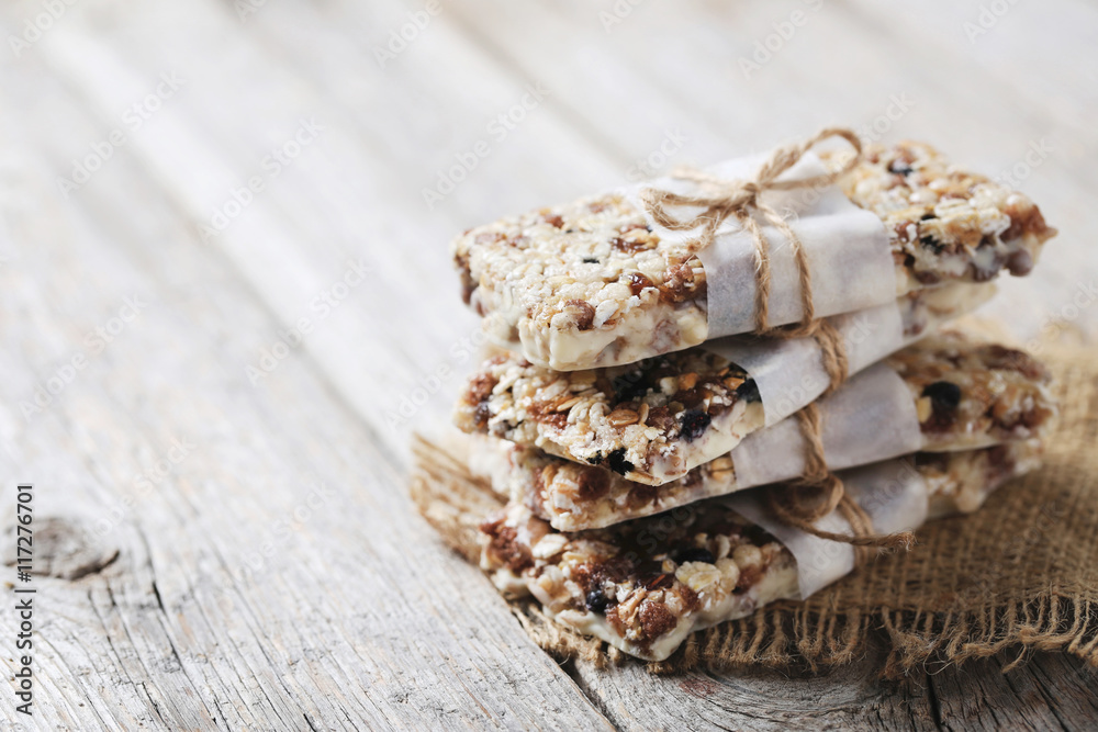 Granola bar on a grey wooden table