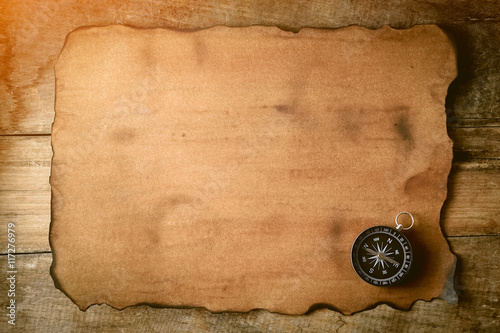 old paper and compass for vintage background

