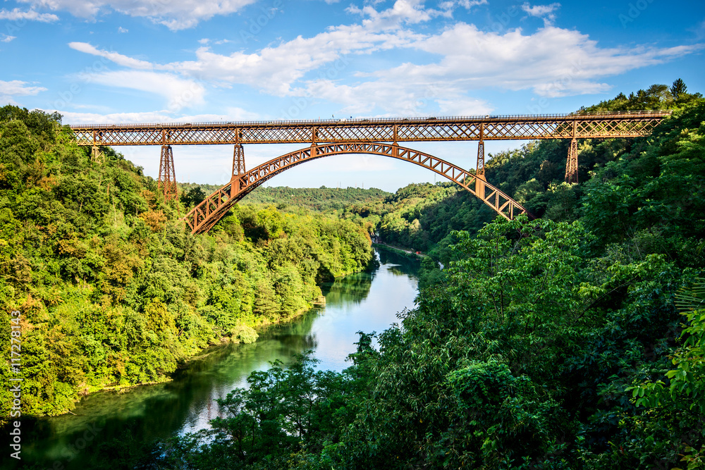 iron bridge over the river Adda Lombardia Italy iron bridge over the river Adda Lombardia Italy