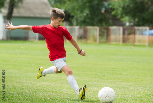  Boys kicking ball