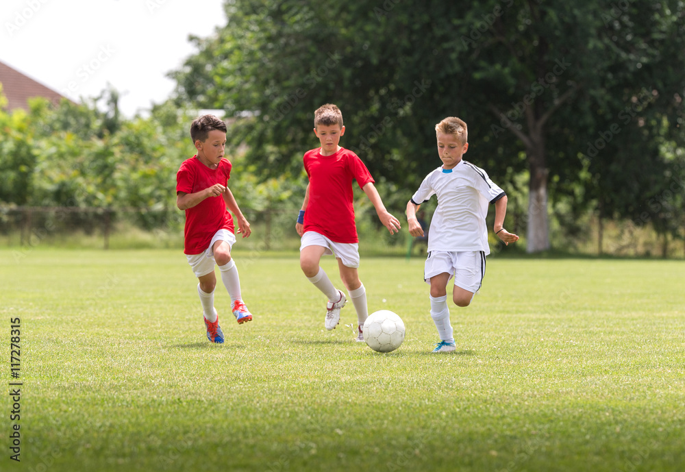 Boys on the football training on the court Boys on the football training on the court