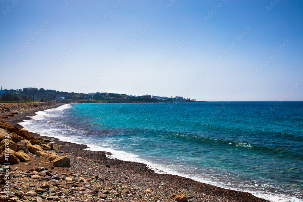 Pebbles Beach and Blue Sea. Toned