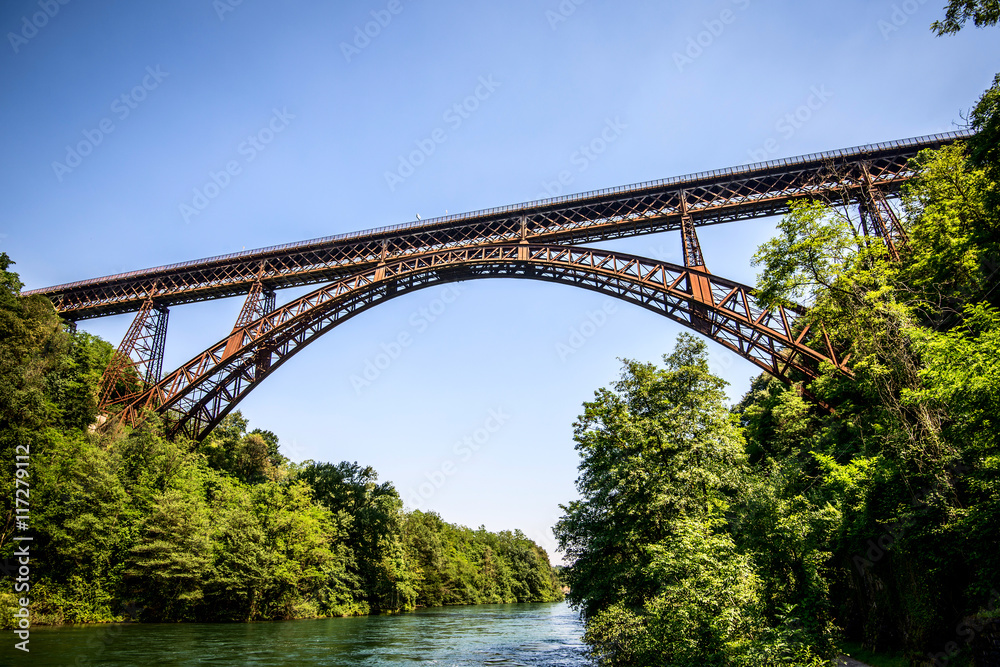 iron bridge over the river Adda Lombardia Italy