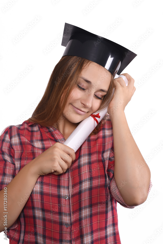 Student with diploma and graduation cap Student with diploma and graduation cap