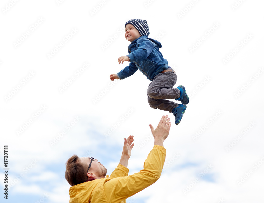 father with son playing and having fun outdoors