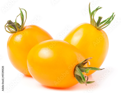 three yellow tomato isolated on white background