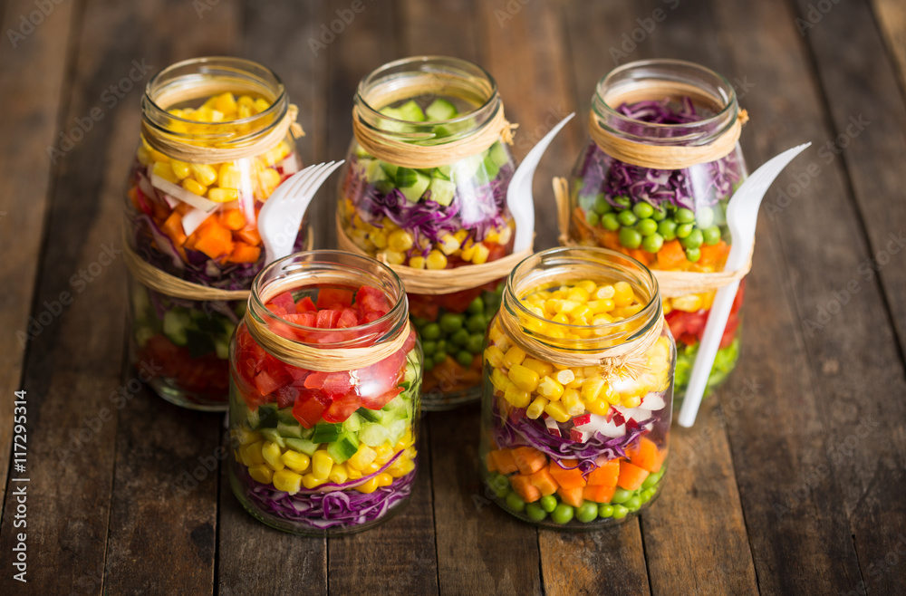 Fresh vegetable salad in a mason jar Fresh vegetable salad in a mason jar