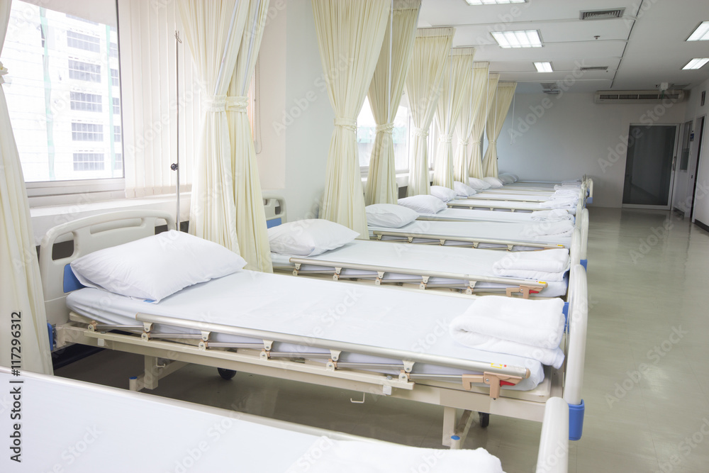 Hospital ward with beds and medical equipment - obrazy, fototapety, plakaty 
