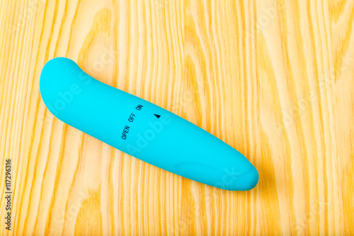 blue Sex toy isolated on a table photo