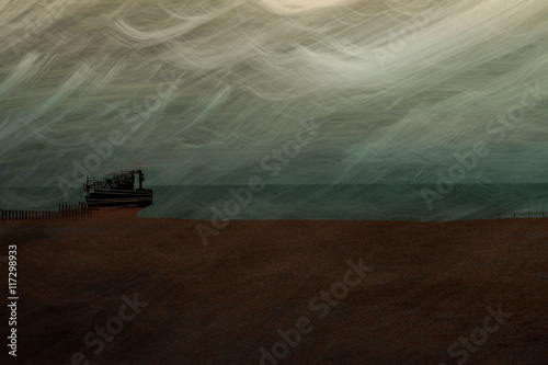 Boat moored on beach