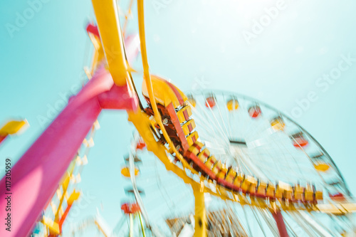 Fototapeta Rollercoaster in theme park